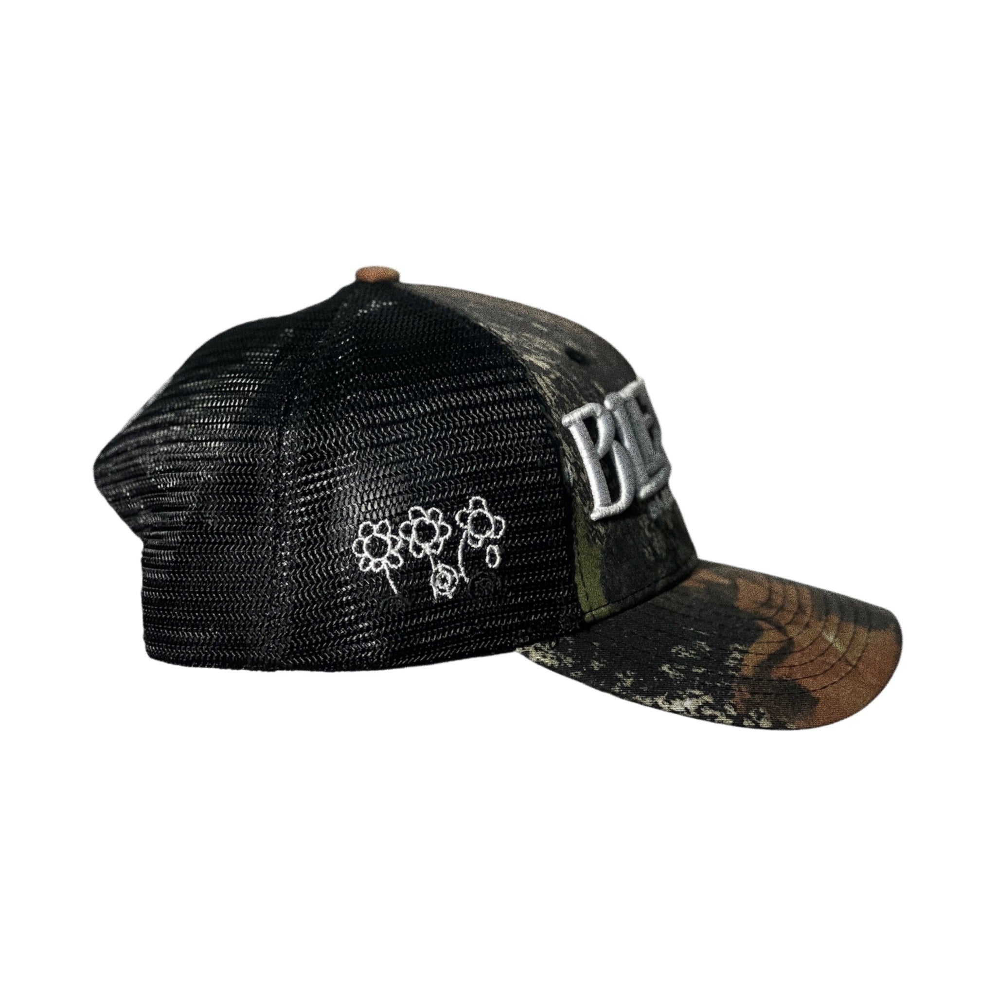 CAMO FLOWER TRCKR HAT